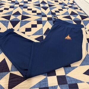 Disney Blue pants with Gold 50th anniversary Logo